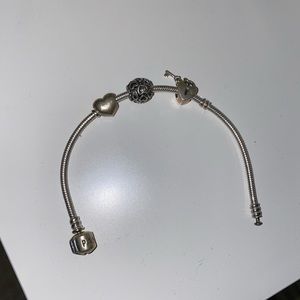 Pandora bracelet with three charms 🤍